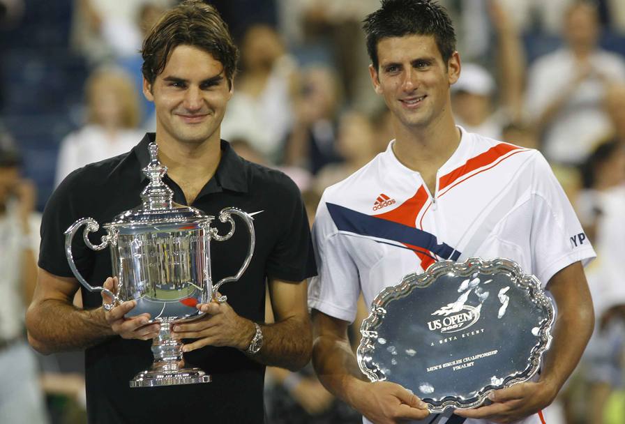 Roger Federer con Novak Djokovic. (Lapresse)